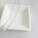 Сребърно колие с форма на сърце и лапа с висящ елемент