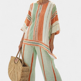 Елегантен комплект от лен и бамбук с райета и асиметрична блуза и широки панталони за изтънчен стил