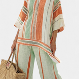 Елегантен комплект от лен и бамбук с райета и асиметрична блуза и широки панталони за изтънчен стил