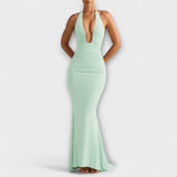 Елегантна гала рокля с открит гръб и впечатляващо деколте