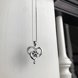 Неколие с безкрайно сърце и лапа от неръждаема стомана за жени